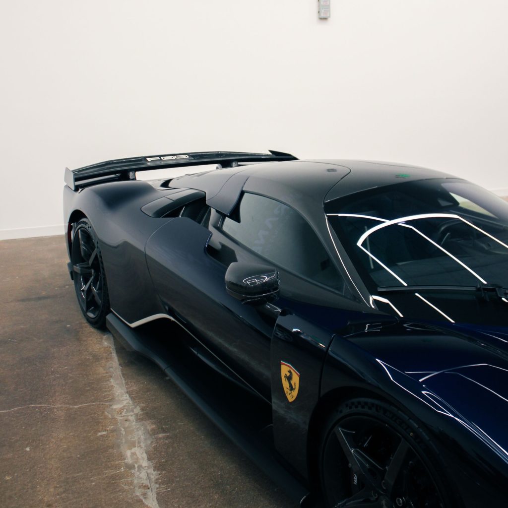 First Ferrari F80 arrives in Dallas wearing a wild color-shifting paint job that changes from blue to green