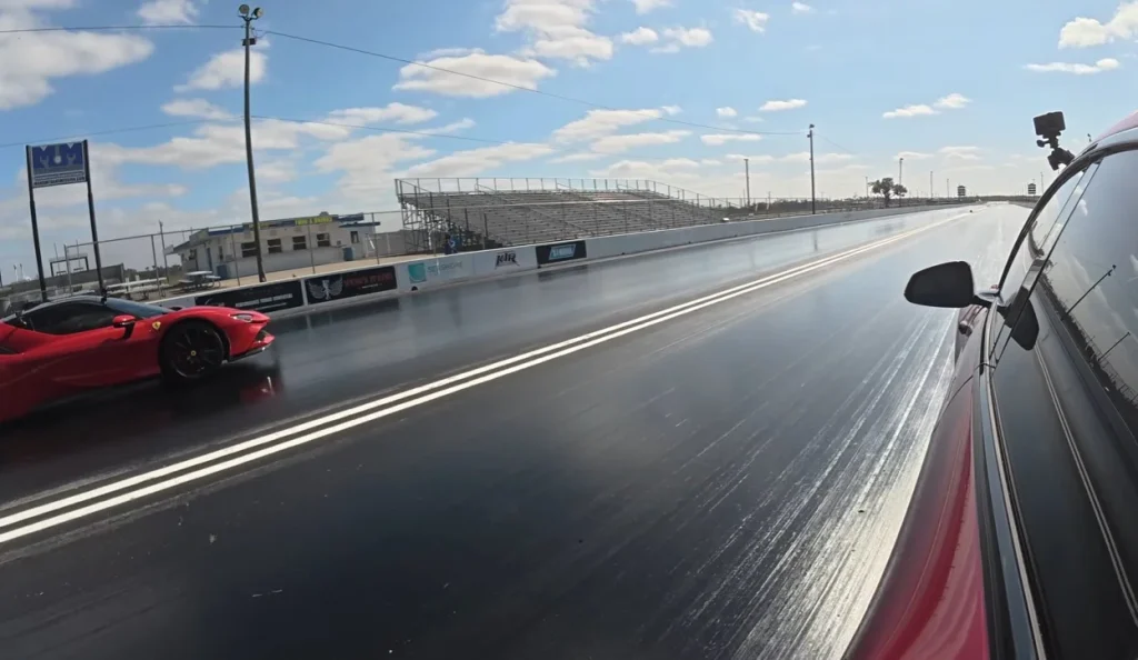 A Florida drag race between a Tesla Model S Plaid and a 1,200 hp Ferrari SF90 results in a new personal best time for the electric sedan at Bradenton