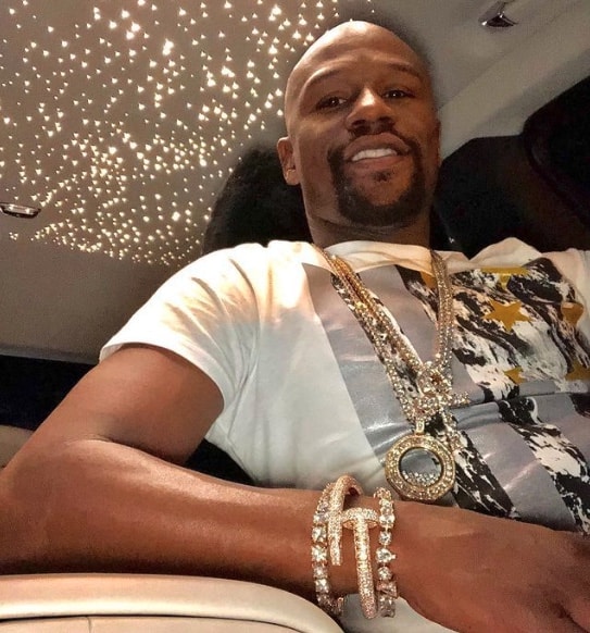 Floyd Mayweather with millions in jewelry