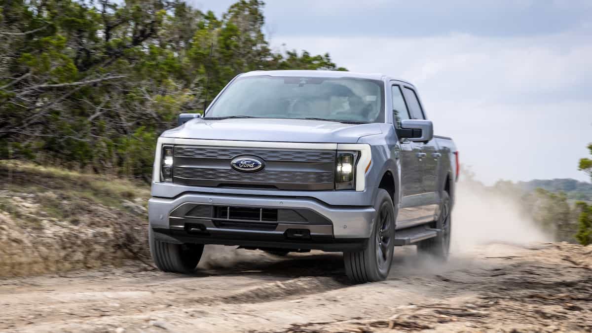Ford F-150 Lightning electric truck driving off-road