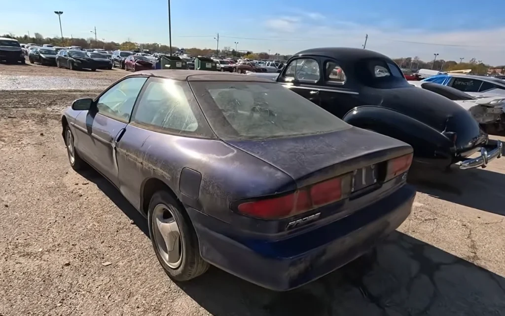 A hidden corner of an Indianapolis Copart yard revealed an emotional surprise: a Mitsubishi 3000GT and a neglected Ford Probe waiting for a second chance.