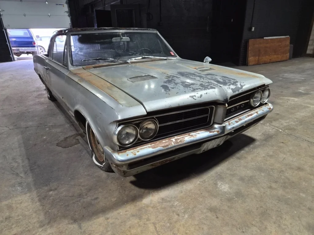 Ohio man discovers 1964 GTO in ultimate barn find that ticks every single box you'd want