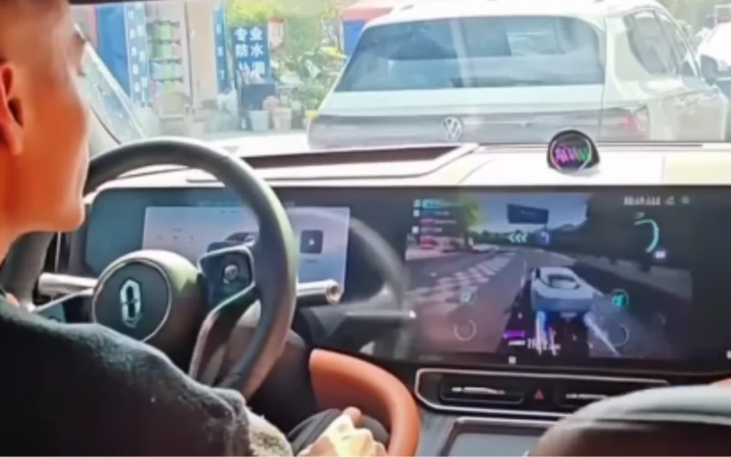 The Huawei AITO M9 is going one step forward with its tech, by allowing people to play racing games using the car's actual steering wheel