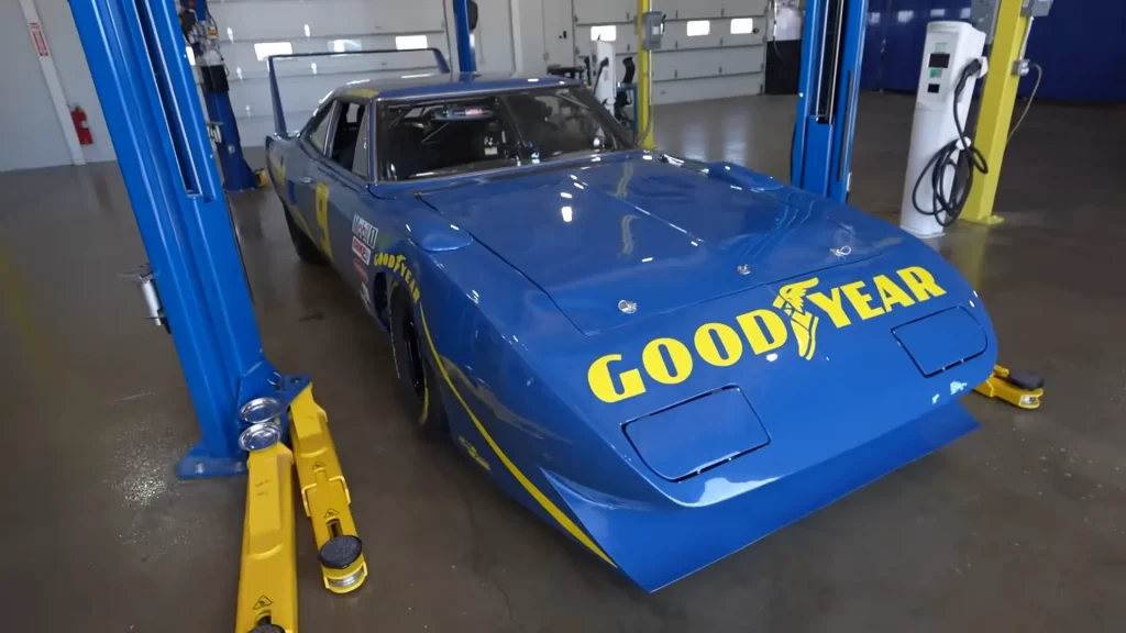 Emelia Hartford drove her barn find Plymouth Superbird NASCAR muscle car at 200mph for Goodyear