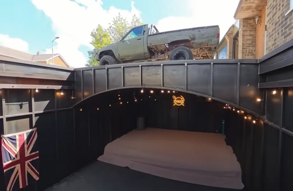 This secret underground garage features a hidden driveway, DIY garage design, and advanced concrete construction under a suburban home