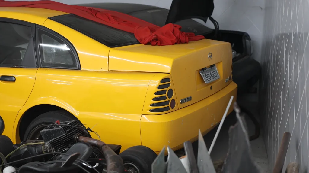 A private car collector and drift legend have built a real life Iron Man garage to house a one of 12 Frankenstein Lotus built exclusively from scrap engines