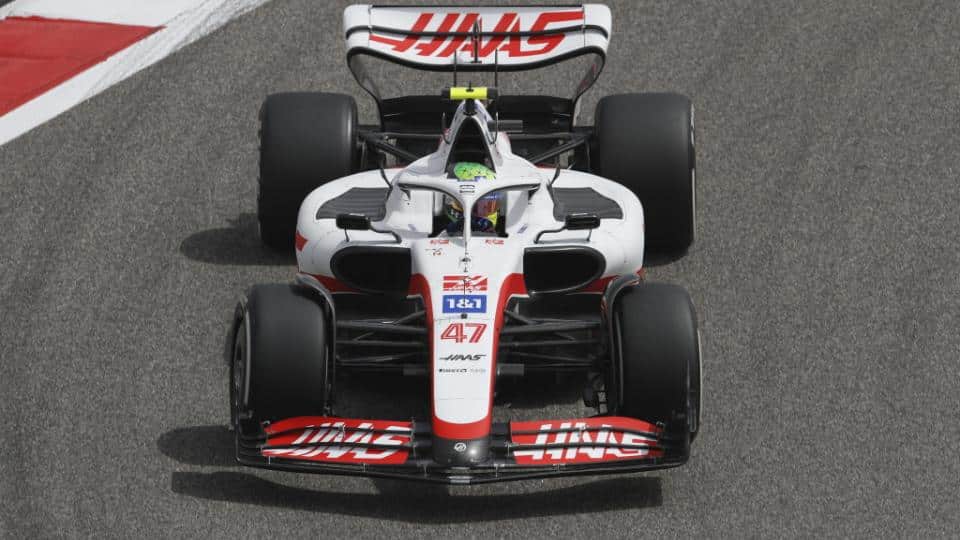 Mick Schumacher's Haas VF-22. A red and white car with prominent Haas branding in red on it.