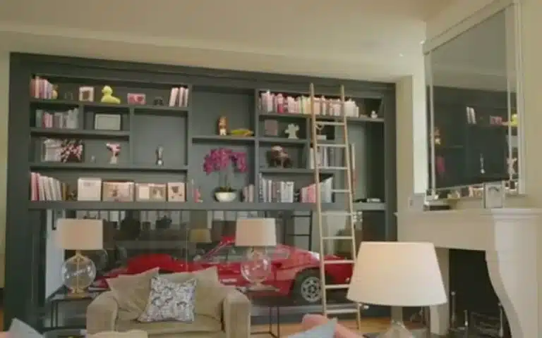 British singer put $6.8M property on the market with a Ferrari parked underneath the bookcase