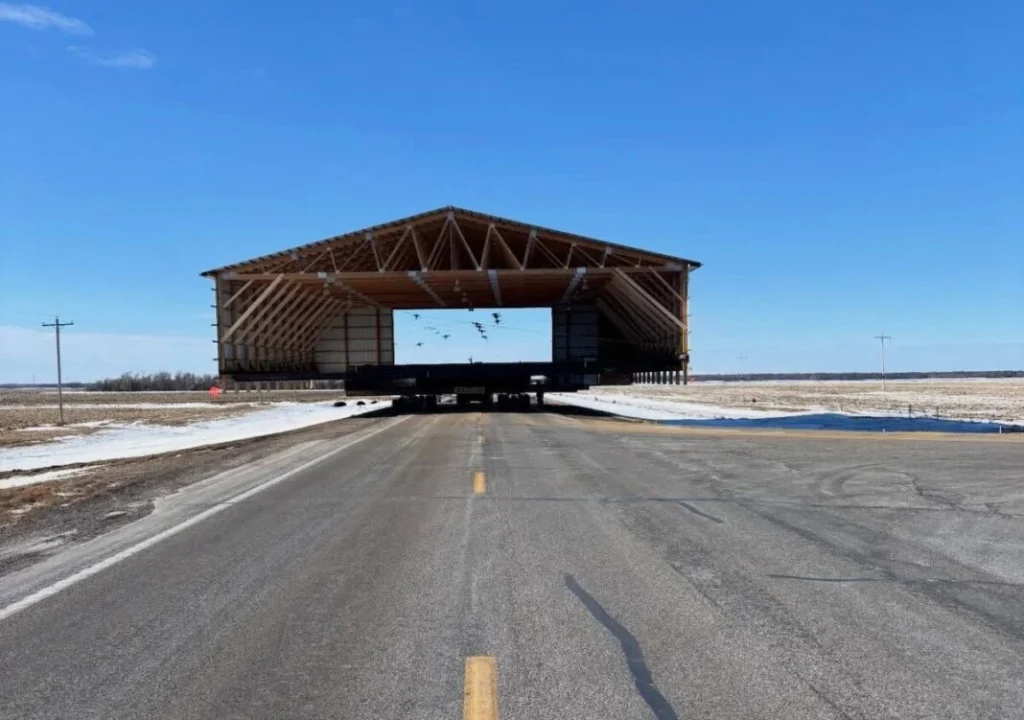 A semi-truck was tasked with hauling an 81-foot-wide building five miles in North Dakota and it took up the entire roadway