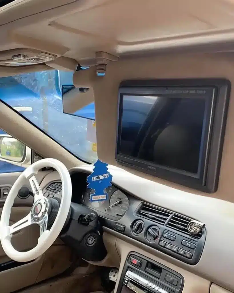 This Honda Accord hides a full PlayStation 2 setup in the dashboard