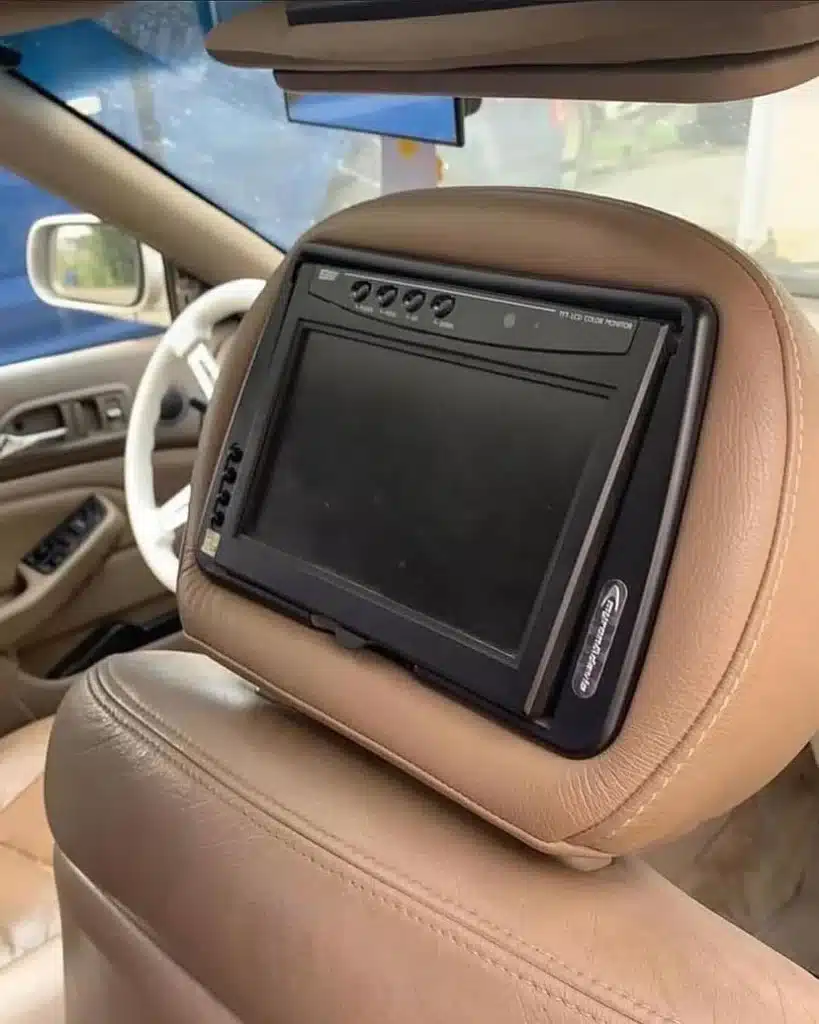 This Honda Accord hides a full PlayStation 2 setup in the dashboard