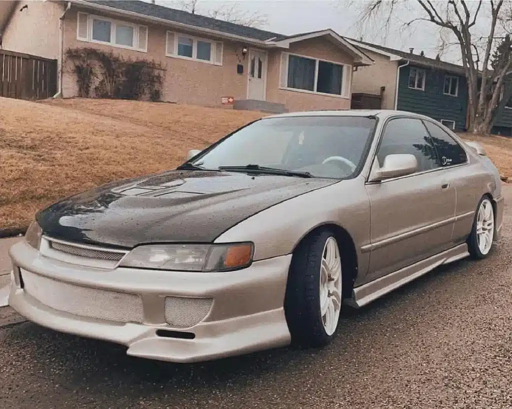This Honda Accord hides a full PlayStation 2 setup in the dashboard