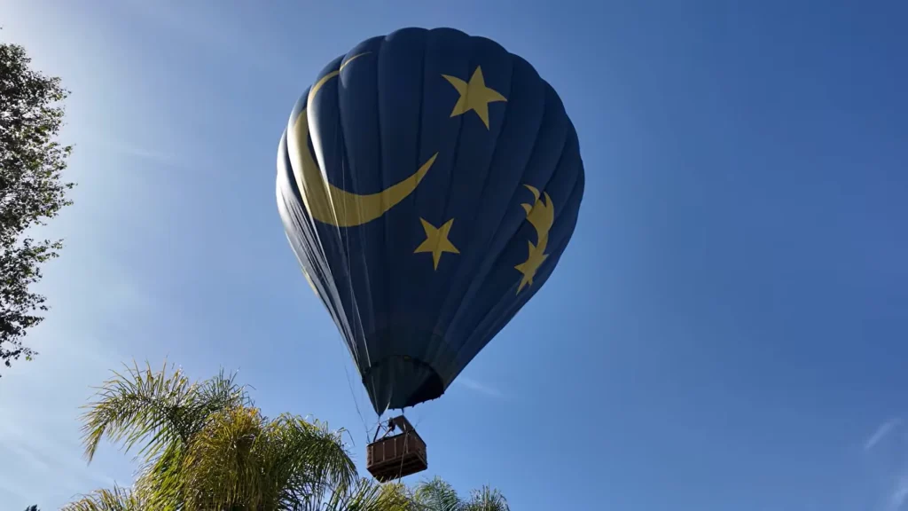 California man shocked to find hot air balloon with 13 strangers in his backyard