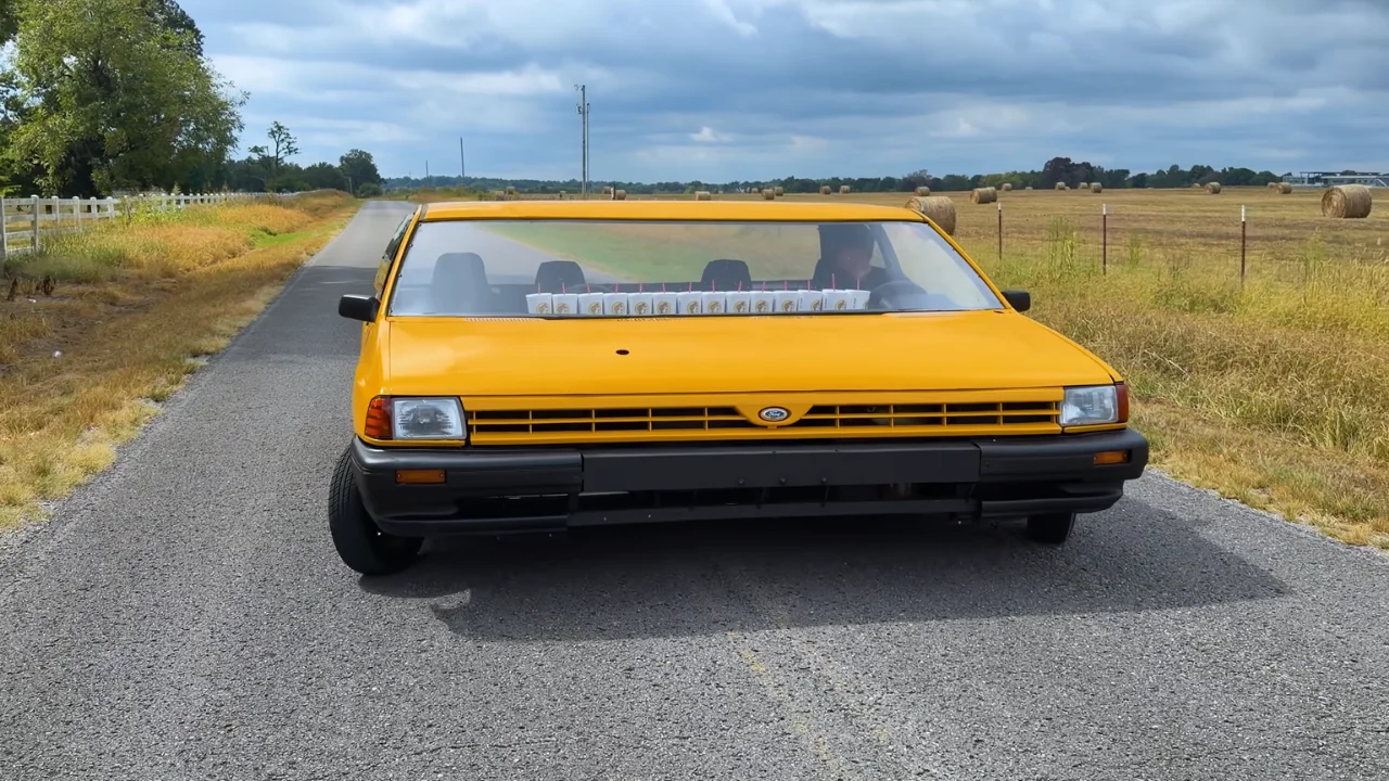 Nashville man who made world's thinnest road-legal car has now turned a tiny Ford Festiva into a bizarre 10-foot-wide highway monster