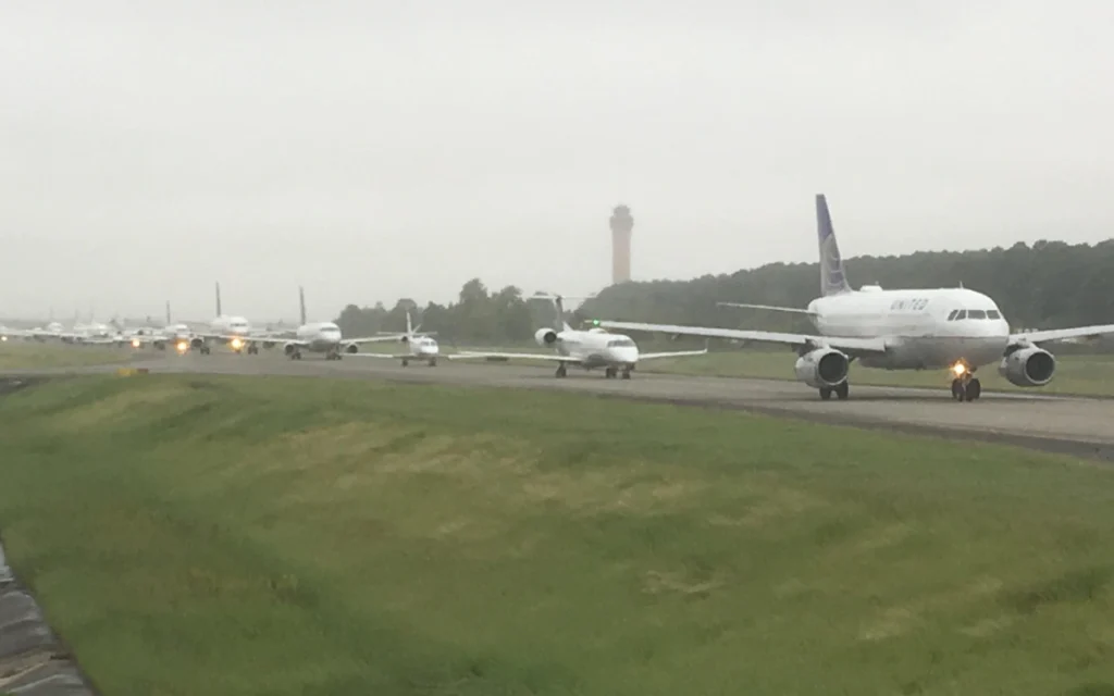 Surreal footage shows a long takeoff queue at Newark Airport