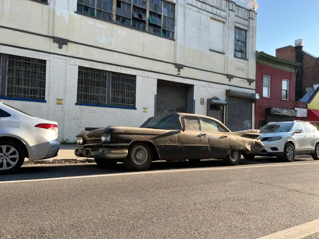 A Brooklyn garage closed and three classic cars were found