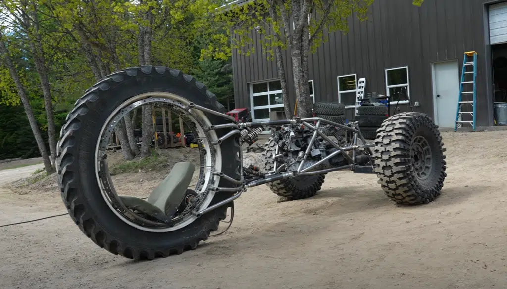 Idaho guys test a 3x3 custom build trike with pushrod suspension, rear-wheel steering, and a diesel-powered frame in their wildest off-road project yet