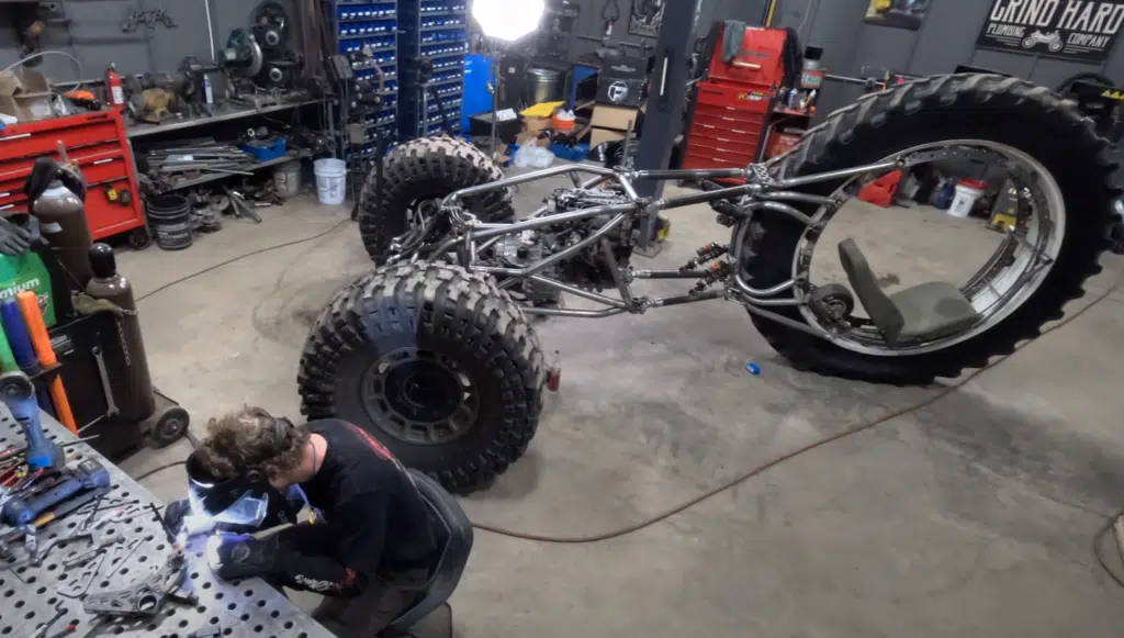 Idaho guys test a 3x3 custom build trike with pushrod suspension, rear-wheel steering, and a diesel-powered frame in their wildest off-road project yet