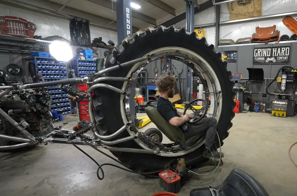Idaho guys test a 3x3 custom build trike with pushrod suspension, rear-wheel steering, and a diesel-powered frame in their wildest off-road project yet