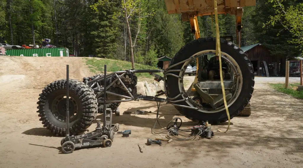 Idaho guys test a 3x3 custom build trike with pushrod suspension, rear-wheel steering, and a diesel-powered frame in their wildest off-road project yet