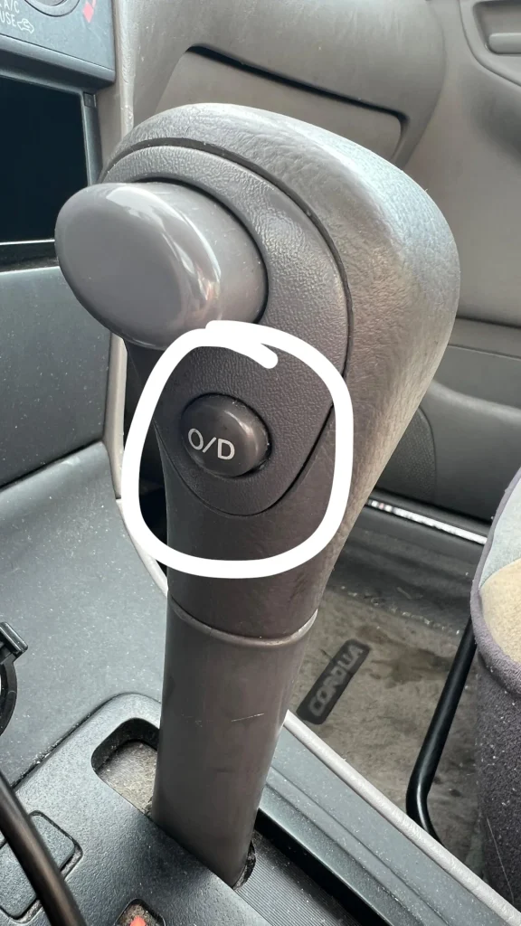 If you drive an automatic vehicle - especially a slightly older model or a truck - you have likely noticed a small button on or near your gear shifter labeled O/D