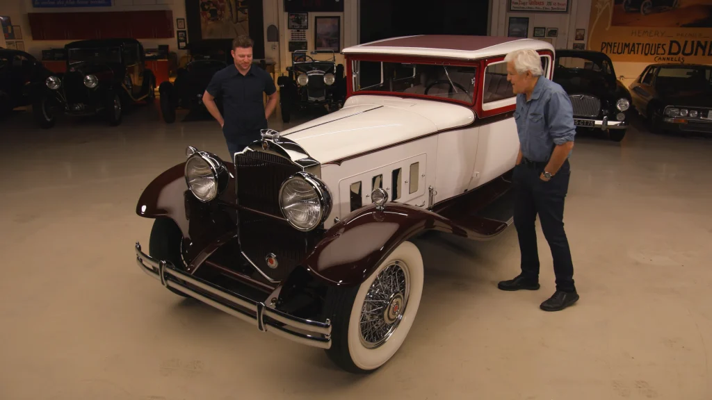 Jay Leno gets a look at a luxury 1930s Packard Victoria coupe