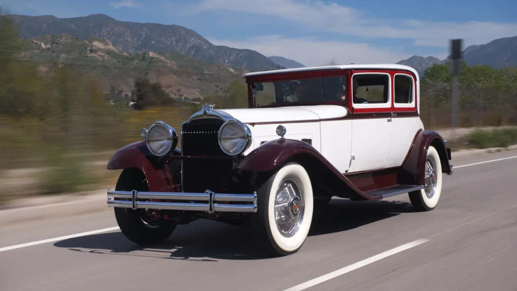 Jay Leno gets a look at a luxury 1930s Packard Victoria coupe