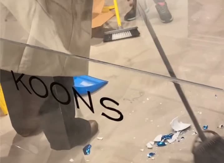 Jeff Koons balloon dog being swept up