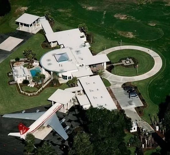 John Travolta owns an impressive mansion in Florida that doubles as an airport