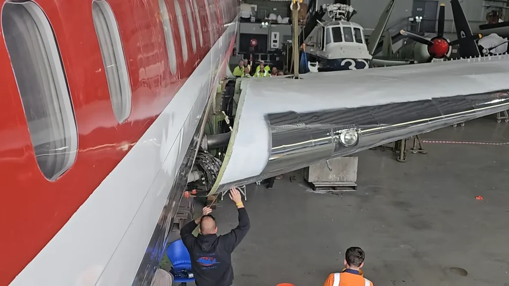 John Travolta's iconic Qantas Boeing 707 reassembly has begun with volunteers helping five-person team to give it a bright future