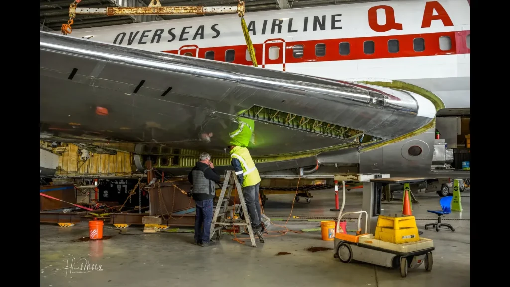 John Travolta's iconic Qantas Boeing 707 reassembly has begun with volunteers helping five-person team to give it a bright future