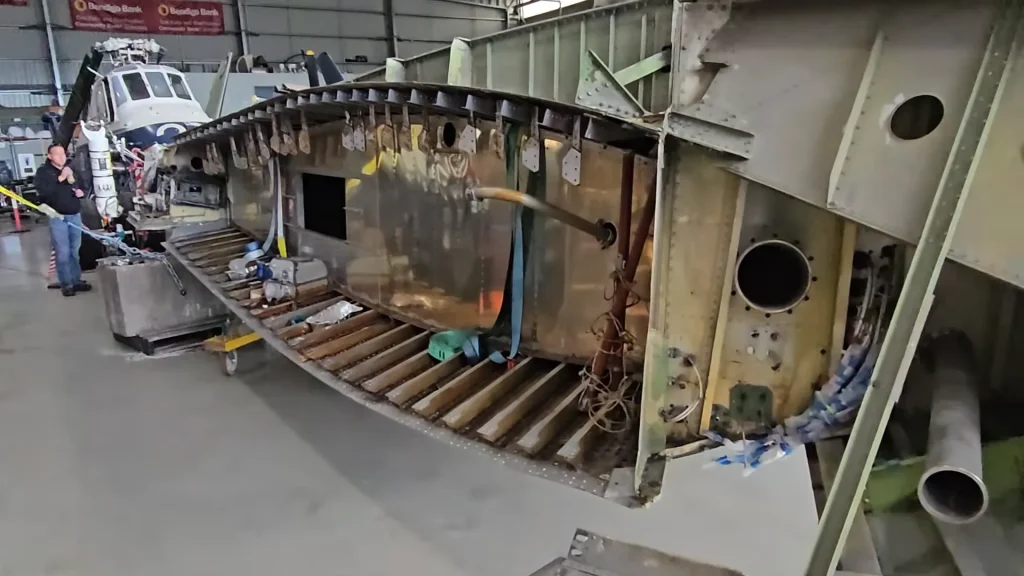 John Travolta's iconic Qantas Boeing 707 reassembly has begun with volunteers helping five-person team to give it a bright future