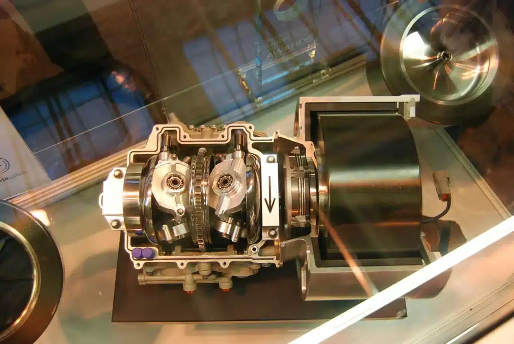 F1 cars currently use a thing called a Kinetic Energy Recovery System (KERS) in order to harvest kinetic energy from braking into electrical energy for the battery.