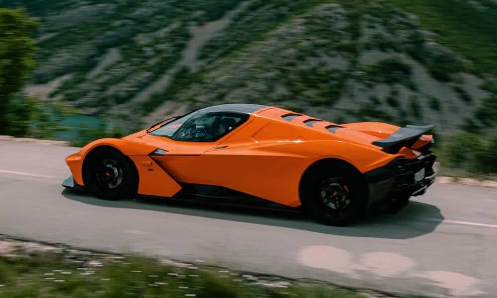 KTM X-Bow GT-XR driving on a mountain road