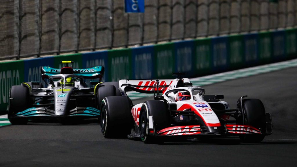 Kevin Magnussen (Haas) and Lewis Hamilton (Mercedes) racing each other during the 2022 Saudi Arabian Grand Prix.