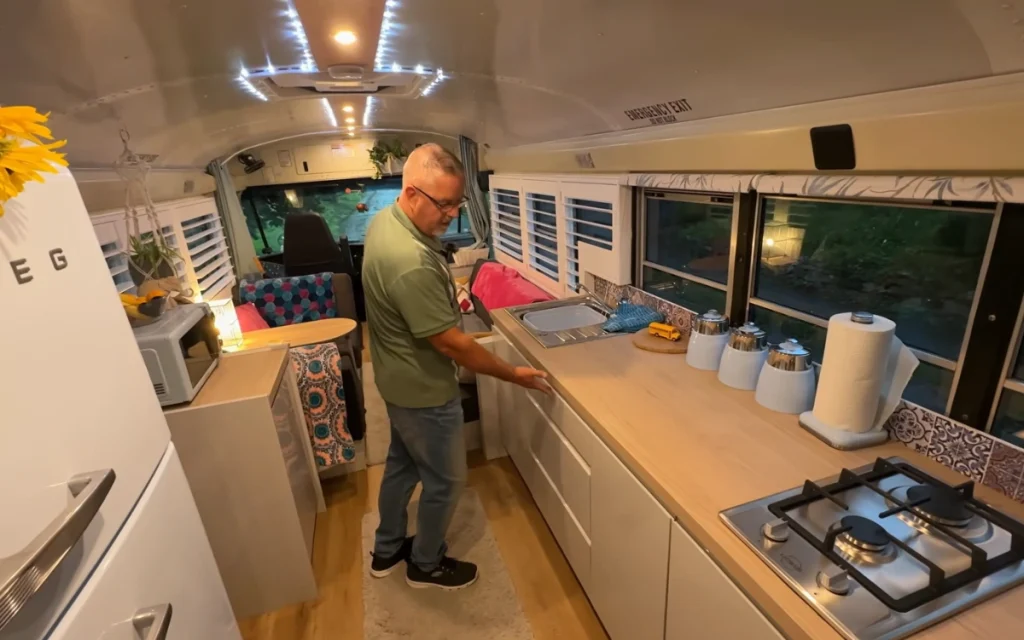 An American school bus reborn as a tiny home might sound quirky, but this English couple made it feel surprisingly practical.