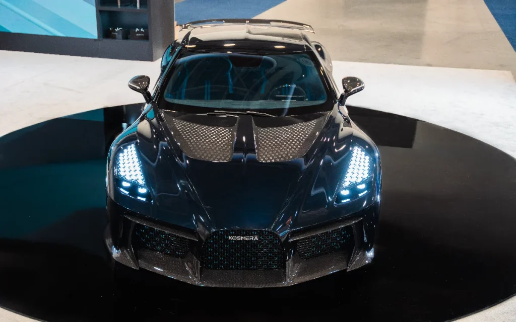 Kosmera revealed two EV hypercars, one that deploys a drone and one with an inbuilt AI race engineer, and the world will decide which one survives