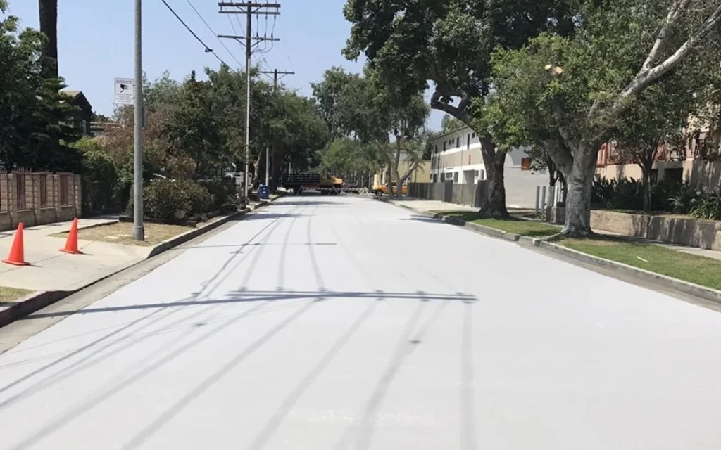 Los Angeles is protecting cars and pets by painting its streets white, and the formerly military concealant could be coming to your city too