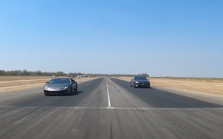 The Lamborghini Huracan held on to beat the Tesla.