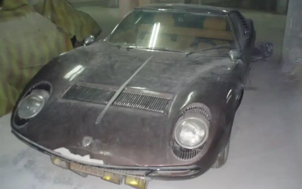 A musician dubbed 'Greek Elvis' left a rare Lamborghini Miura S rotting in a hotel parking lot for 30 years after refusing to fix the iconic V12 engine