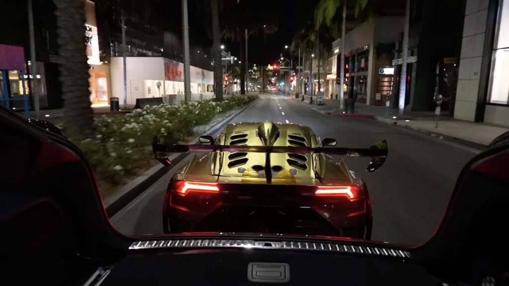 Watch this guy tow a truck with his Huracan