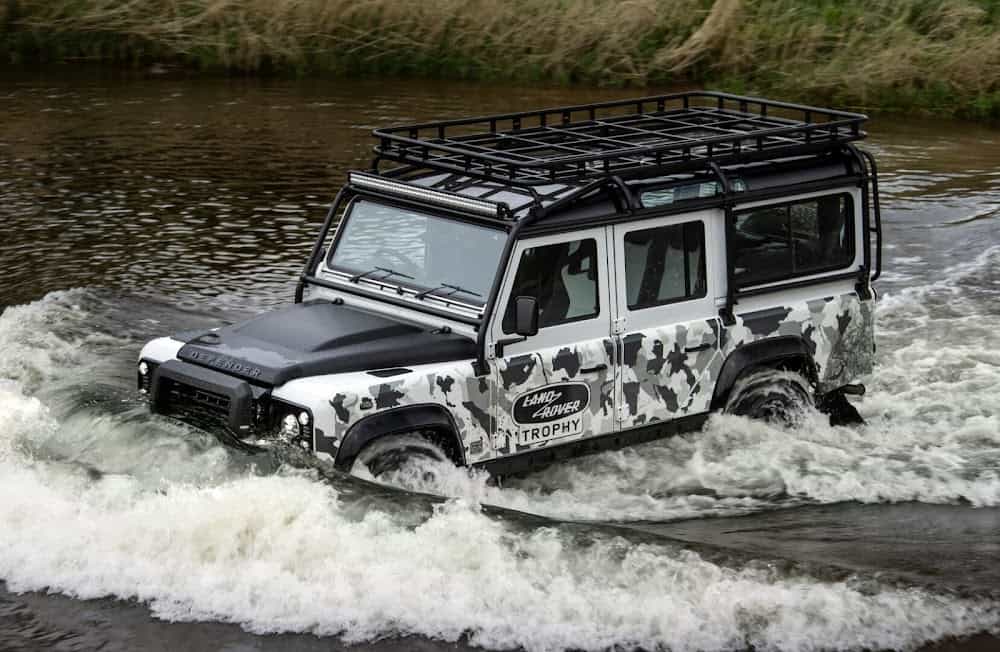Land Rover Defender Works V8 Trophy II wading through water