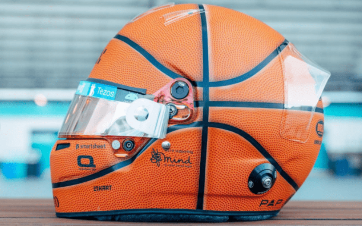 Lando Norris has a basketball coloured helmet for Miami Formula 1 GP
