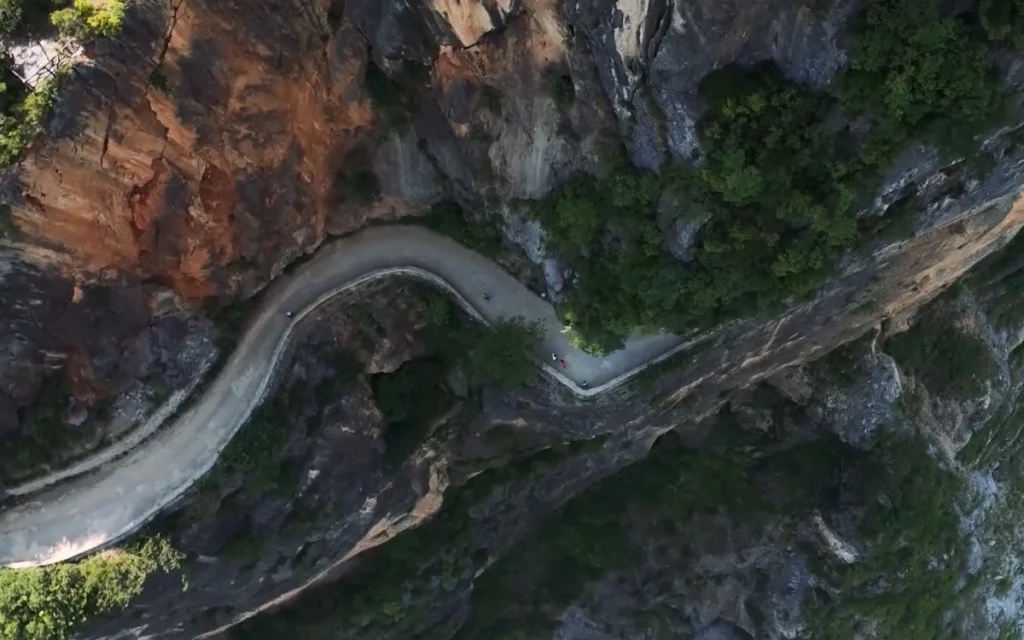The Lanying Cliff Road in Chongqing, China, is one of the most dangerous roads on Earth, but hearing its origin story will leave you completely flabbergasted.