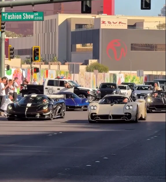 Christian Von Koenigsegg and Horacio Pagani side by side in brand new cars shut down Vegas strip