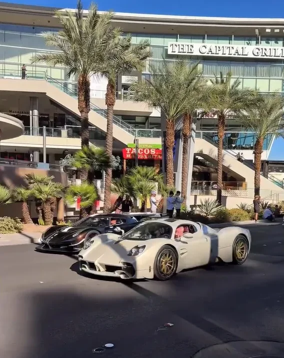 Christian Von Koenigsegg and Horacio Pagani side by side in brand new cars shut down Vegas strip