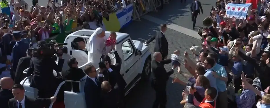 Pope Leo XIV offered his blessing to two children in the crowd on the way to his inaugural Mass.