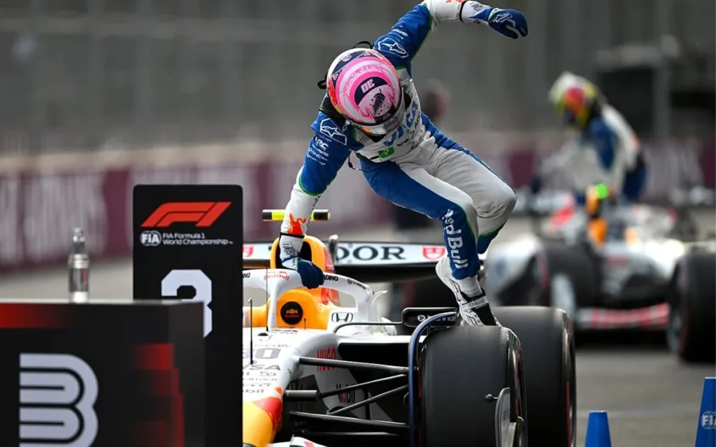 One Tesla driver left a motorbike racing commentator stunned after it halted an official race by driving the wrong way onto the hot track