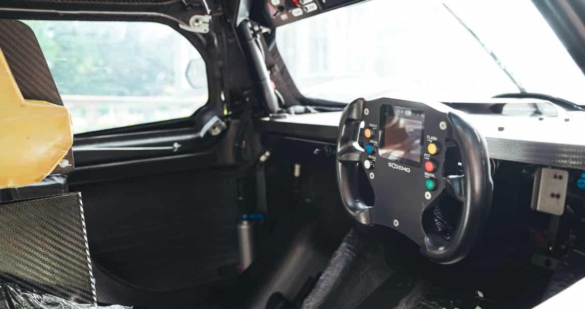 Racing wheel inside the Ligier JS P4