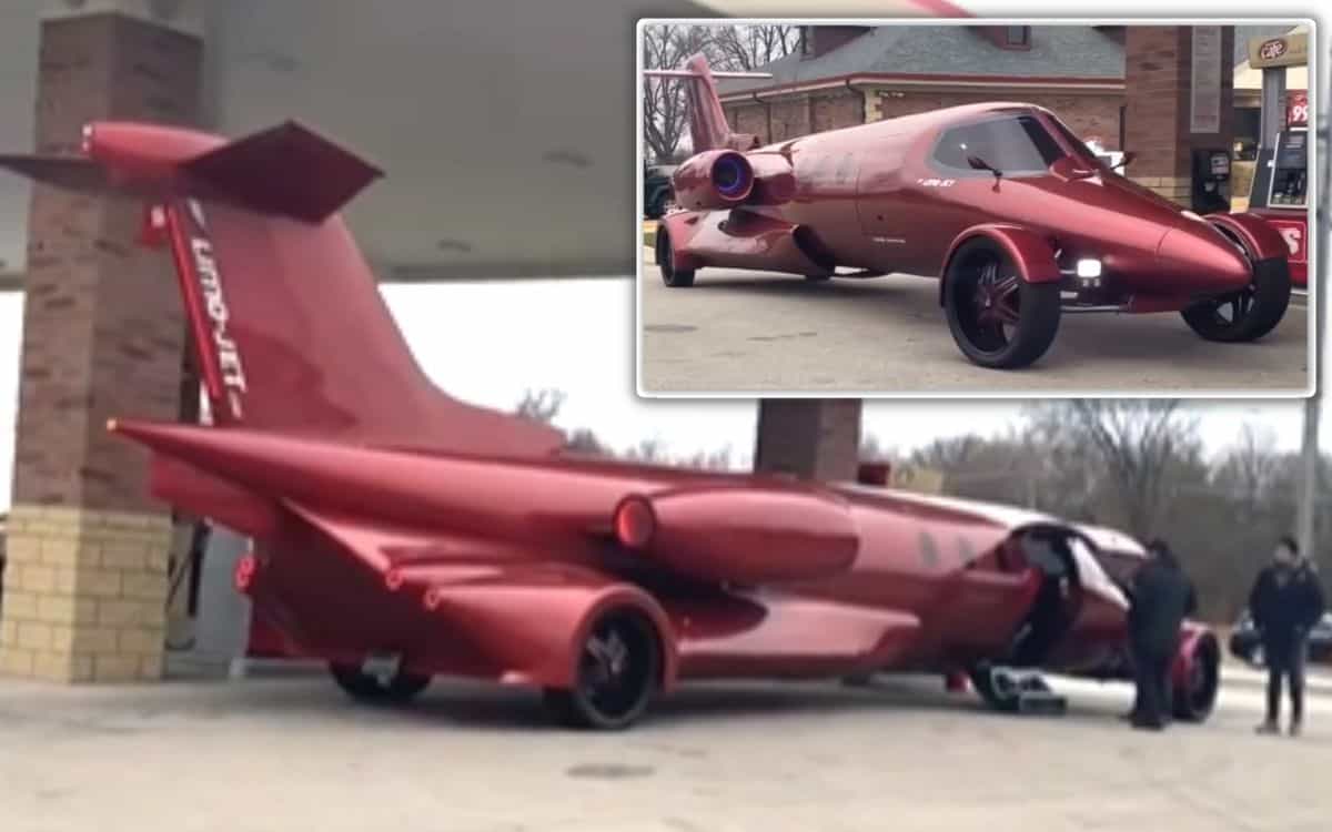 A red limo jet at a gas station